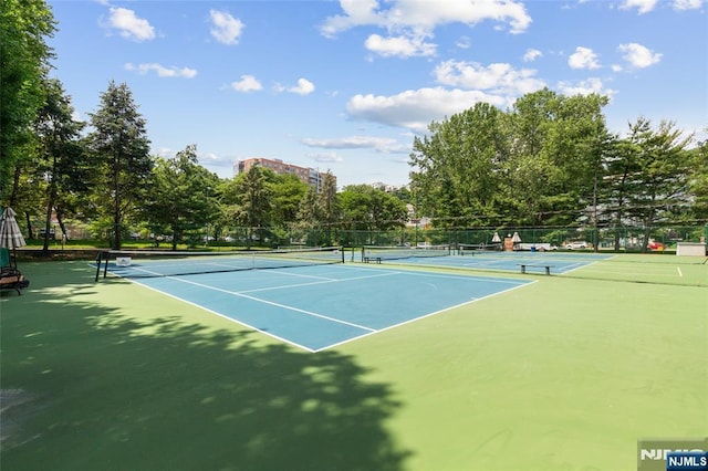207 Jefferson Ct, Edgewater, NJ 07020 - view of tennis court featuring view of scattered trees