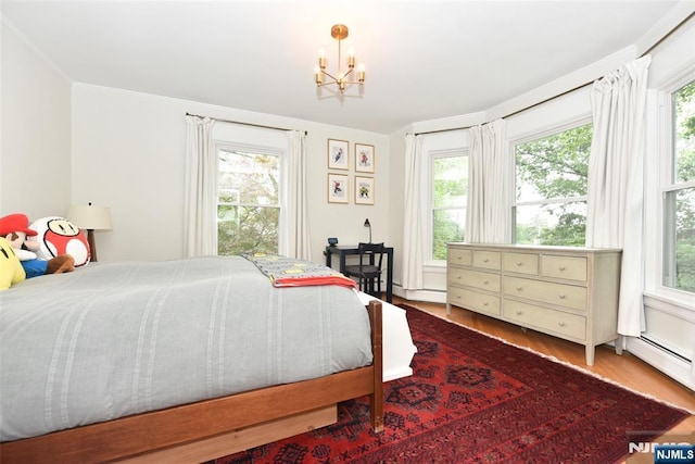 4 4th St, Park Ridge, NJ 07656 - bedroom featuring a chandelier, multiple windows, and ornamental molding