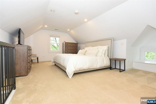4 4th St, Park Ridge, NJ 07656 - bedroom with light colored carpet, vaulted ceiling, and recessed lighting