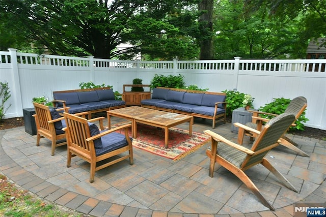4 4th St, Park Ridge, NJ 07656 - fenced backyard featuring an outdoor hangout area and a patio