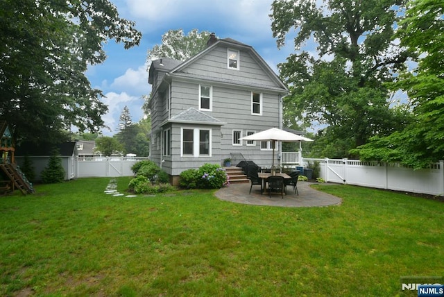 4 4th St, Park Ridge, NJ 07656 - rear view of house with a gate, a fenced backyard, a patio area, and a chimney