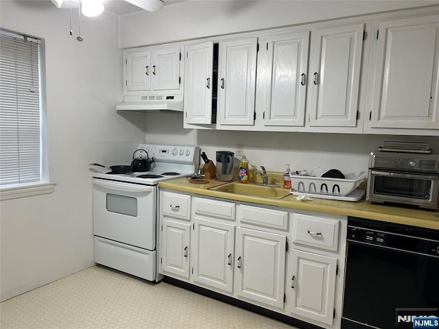 590 Center Unit 2, Oradell, NJ 07649 - kitchen featuring electric range, dishwasher, under cabinet range hood, light countertops, and white cabinets
