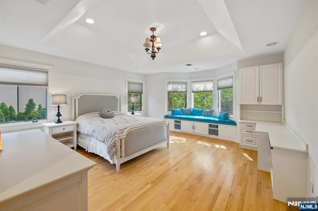 71 Roberts Rd, Englewood Cliffs, NJ 07632 - bedroom featuring a raised ceiling, recessed lighting, light wood-type flooring, and a chandelier