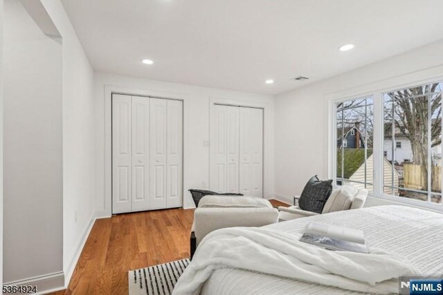 5 Midland, Glen Ridge, NJ 07028 - bedroom with multiple closets, wood finished floors, and recessed lighting