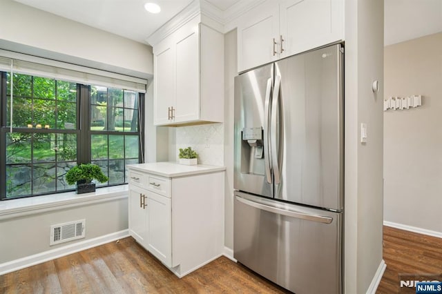 181 Long Hill Rd Unit H3, Little Falls, NJ 07424 - kitchen with stainless steel fridge, white cabinets, light countertops, dark wood-style flooring, and recessed lighting