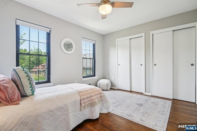 181 Long Hill Rd Unit H3, Little Falls, NJ 07424 - bedroom with two closets, wood finished floors, and a ceiling fan