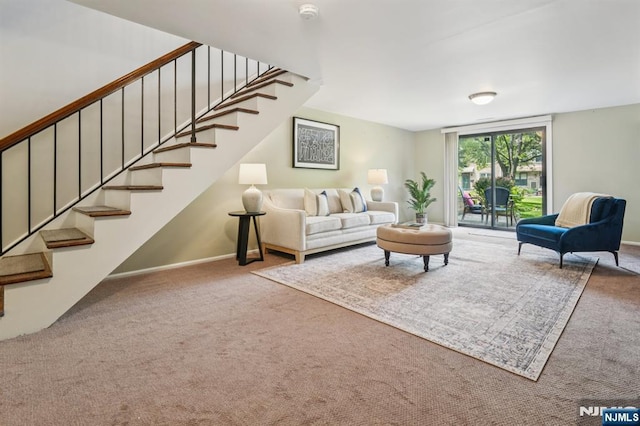 181 Long Hill Rd Unit H3, Little Falls, NJ 07424 - carpeted living area with stairway and baseboards
