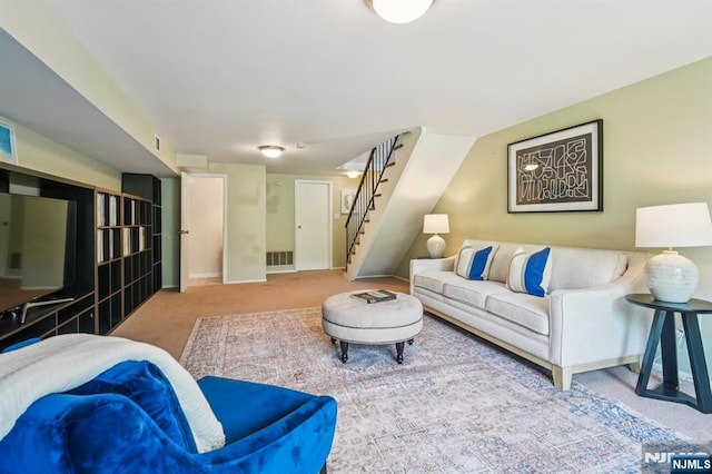 181 Long Hill Rd Unit H3, Little Falls, NJ 07424 - carpeted living room featuring stairway and baseboards