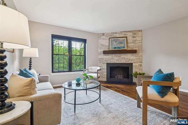 181 Long Hill Rd Unit H3, Little Falls, NJ 07424 - living room featuring wood finished floors and a fireplace