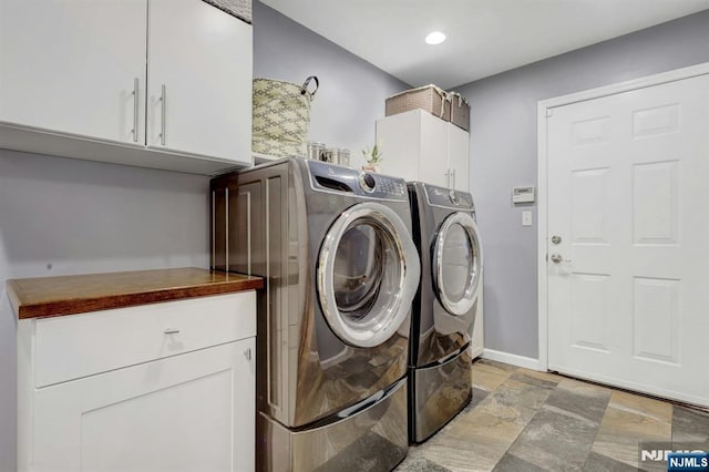 11 Katharina Pl, Twp Of Washington, NJ 07676 - laundry area with cabinet space, washer and clothes dryer, stone tile flooring, and recessed lighting