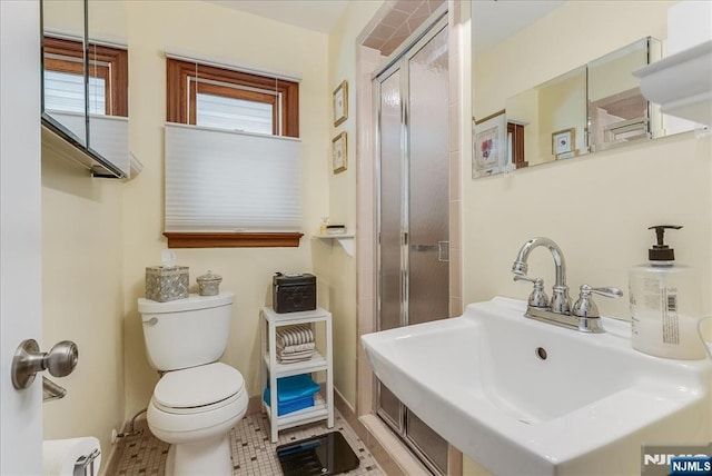63 Kathleen Ct, Wayne, NJ 07470 - bathroom featuring a sink and a shower with shower door
