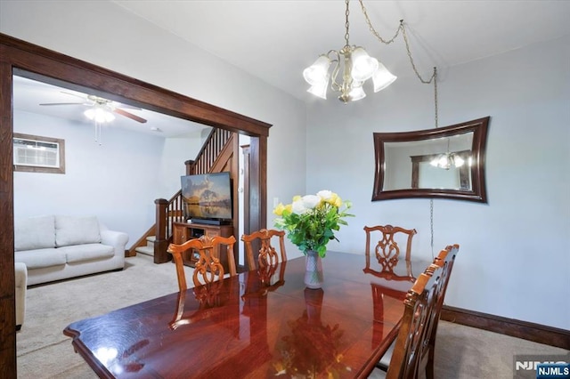 30 Zeliff Ave, Little Falls, NJ 07424 - dining area featuring carpet flooring, stairs, a chandelier, a wall mounted AC, and a ceiling fan