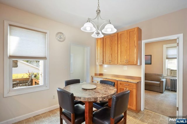 30 Zeliff Ave, Little Falls, NJ 07424 - dining room featuring radiator and a chandelier