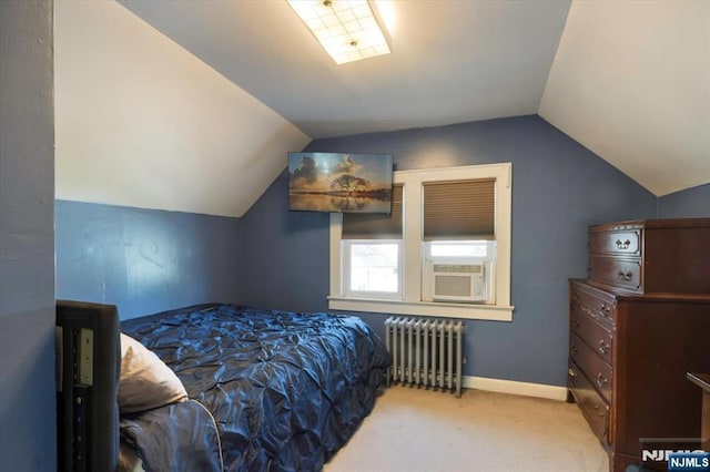 30 Zeliff Ave, Little Falls, NJ 07424 - carpeted bedroom with radiator heating unit, lofted ceiling, and cooling unit
