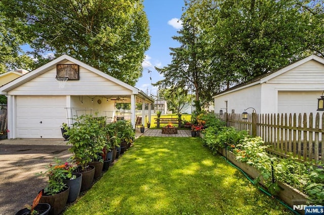 30 Zeliff Ave, Little Falls, NJ 07424 - view of yard with a garage and an outdoor structure