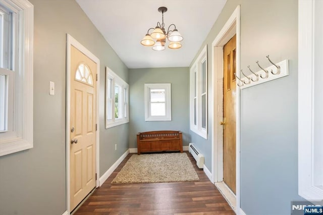 30 Zeliff Ave, Little Falls, NJ 07424 - foyer featuring a chandelier, a baseboard radiator, and dark wood finished floors