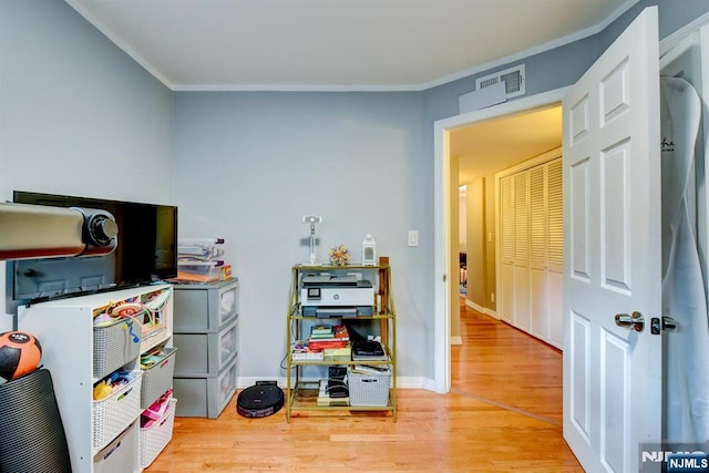 139 Donato Dr, Little Falls, NJ 07424 - recreation room featuring crown molding and light wood-style floors