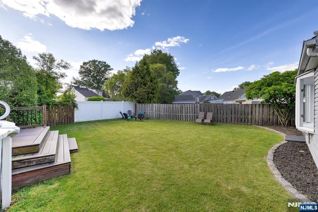 139 Donato Dr, Little Falls, NJ 07424 - fenced backyard with a wooden deck