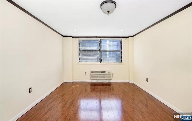 111 Mulberry St Unit 1418, Newark, NJ 07102 - spare room featuring crown molding, wood finished floors, and a wall unit AC