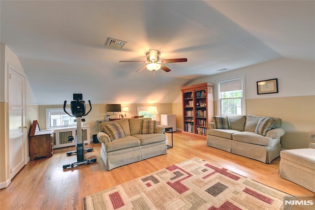 306 Boulevard, Pequannock Township, NJ 07444 - living area with radiator heating unit, vaulted ceiling, ceiling fan, and light wood-style floors