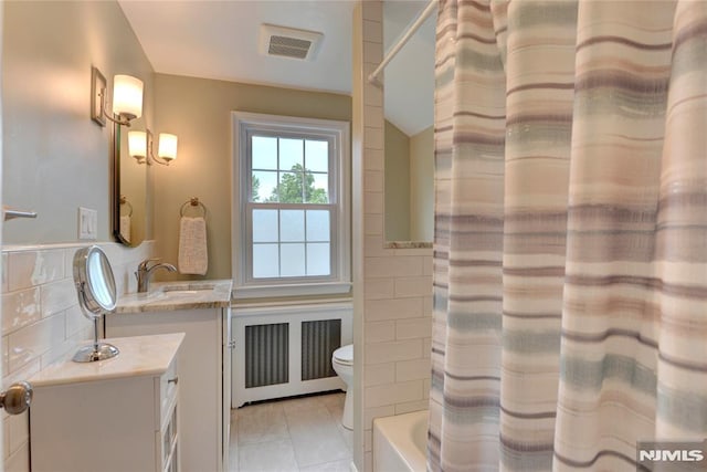 306 Boulevard, Pequannock Township, NJ 07444 - bathroom with vanity, tile walls, shower / tub combo with curtain, tile patterned floors, and radiator