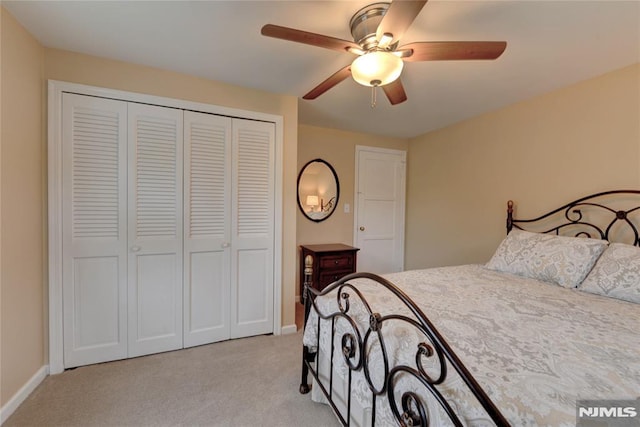 306 Boulevard, Pequannock Township, NJ 07444 - bedroom with light colored carpet, a closet, and ceiling fan
