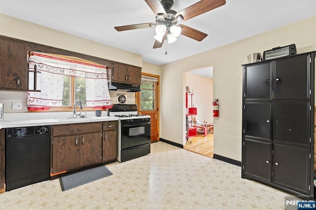 132 17th St, Prospect Park, NJ 07508 - kitchen with dishwasher, gas range, light flooring, under cabinet range hood, and light countertops