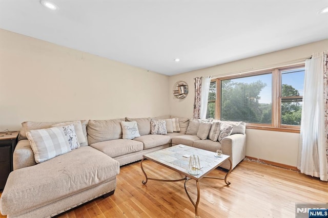 132 17th St, Prospect Park, NJ 07508 - living area with light wood-style flooring and recessed lighting