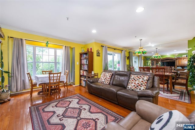 143 Summit Rdg, Pompton Lakes, NJ 07442 - living room with hardwood / wood-style flooring, ornamental molding, and recessed lighting