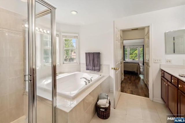 66 Spruce Ln, North Haledon, NJ 07508 - full bathroom with vanity, connected bathroom, a bath, and a stall shower
