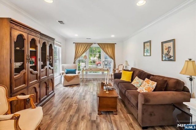 66 Spruce Ln, North Haledon, NJ 07508 - living area featuring light wood-style floors, ornamental molding, and recessed lighting