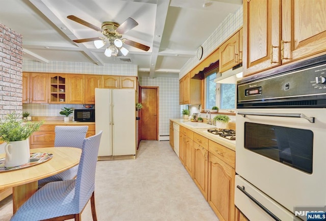 76 Central Ln, Secaucus, NJ 07094 - kitchen featuring white appliances, light countertops, beamed ceiling, under cabinet range hood, and a ceiling fan