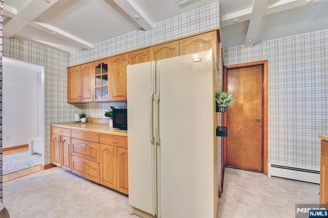 76 Central Ln, Secaucus, NJ 07094 - kitchen featuring freestanding refrigerator, wallpapered walls, beam ceiling, light countertops, and baseboard heating