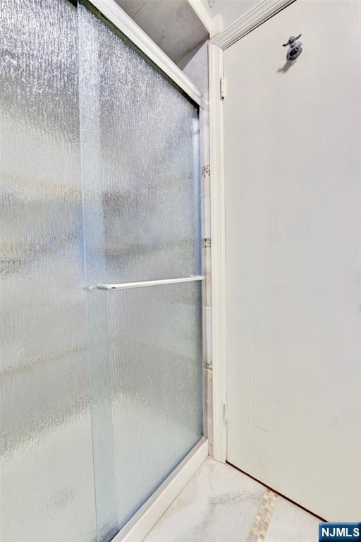 76 Central Ln, Secaucus, NJ 07094 - full bathroom featuring marble finish flooring and a stall shower