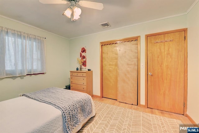 76 Central Ln, Secaucus, NJ 07094 - bedroom with light wood-style floors, crown molding, and a ceiling fan
