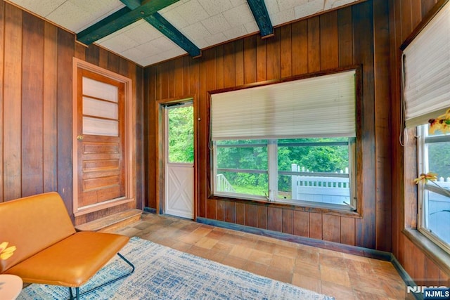 76 Central Ln, Secaucus, NJ 07094 - unfurnished sunroom featuring beam ceiling and healthy amount of natural light