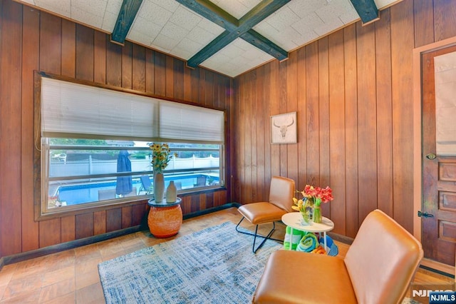 76 Central Ln, Secaucus, NJ 07094 - living area featuring wooden walls and beamed ceiling