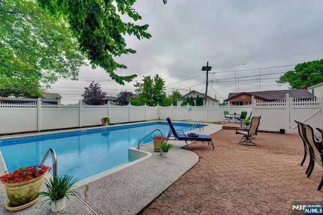 76 Central Ln, Secaucus, NJ 07094 - view of swimming pool with a patio area and a fenced backyard
