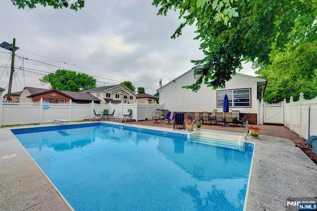 76 Central Ln, Secaucus, NJ 07094 - view of swimming pool featuring a fenced backyard and a patio