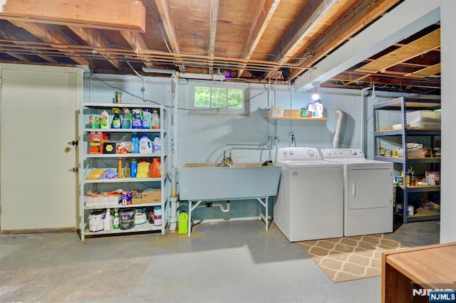 76 Central Ln, Secaucus, NJ 07094 - below grade area featuring washer and clothes dryer and a sink