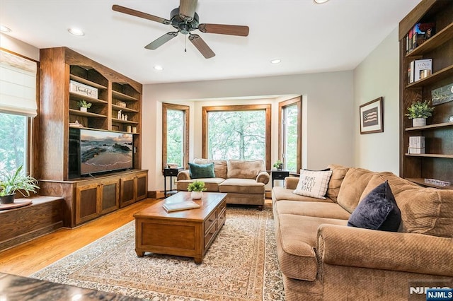 34 Harding Rd, Glen Rock, NJ 07452 - living area featuring healthy amount of natural light, light wood-style floors, ceiling fan, recessed lighting, and built in shelves