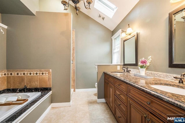 34 Harding Rd, Glen Rock, NJ 07452 - bathroom with a skylight, double vanity, a bath, lofted ceiling, and tile patterned flooring