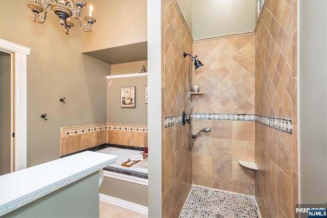34 Harding Rd, Glen Rock, NJ 07452 - full bath with a bath, tiled shower, and a chandelier