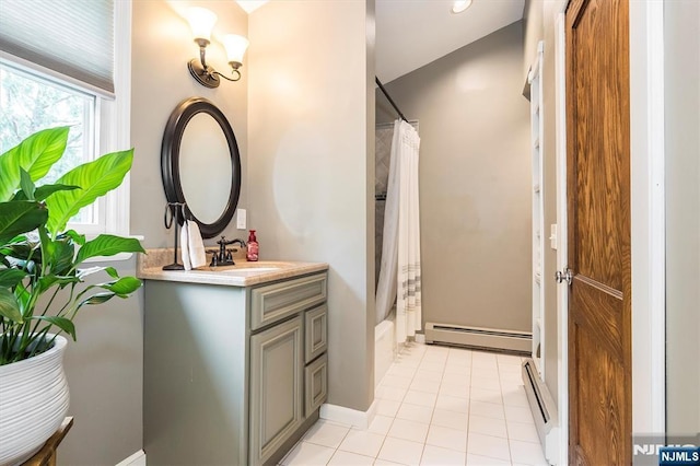 34 Harding Rd, Glen Rock, NJ 07452 - bathroom featuring a baseboard heating unit, vanity, shower / bath combination with curtain, and tile patterned floors