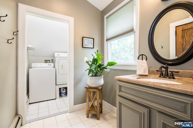 34 Harding Rd, Glen Rock, NJ 07452 - bathroom with a baseboard radiator, washer and dryer, vanity, tile patterned floors, and lofted ceiling