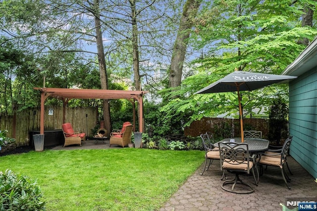 34 Harding Rd, Glen Rock, NJ 07452 - fenced backyard featuring a patio area and outdoor dining space