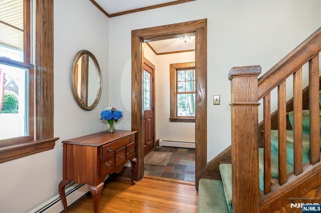 34 Harding Rd, Glen Rock, NJ 07452 - foyer with a baseboard radiator, crown molding, stairway, and wood finished floors