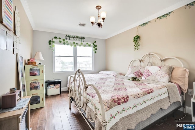 695 Midland Ave, Garfield, NJ 07026 - bedroom with a chandelier, crown molding, and wood finished floors