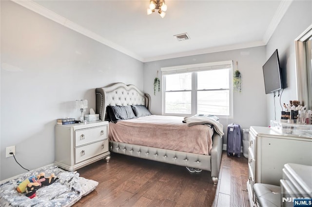 695 Midland Ave, Garfield, NJ 07026 - bedroom with dark wood-style floors and crown molding