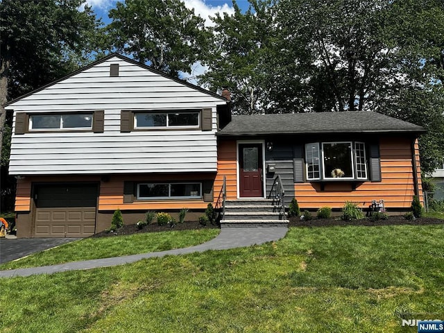 21 Valley Brook Dr, Emerson, NJ 07630 - split level home with a garage, asphalt driveway, and a front lawn